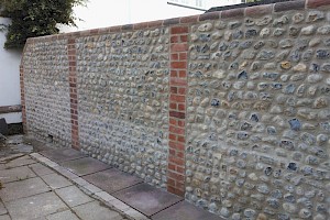 Brickwork restoration to perimeter wall in Essex.